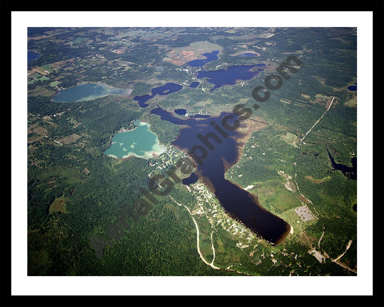 Aerial image of [2979] Half Moon, Blind, Patterson, Woodruff & Watson Lakes in Washtenaw, MI with Black Metal frame