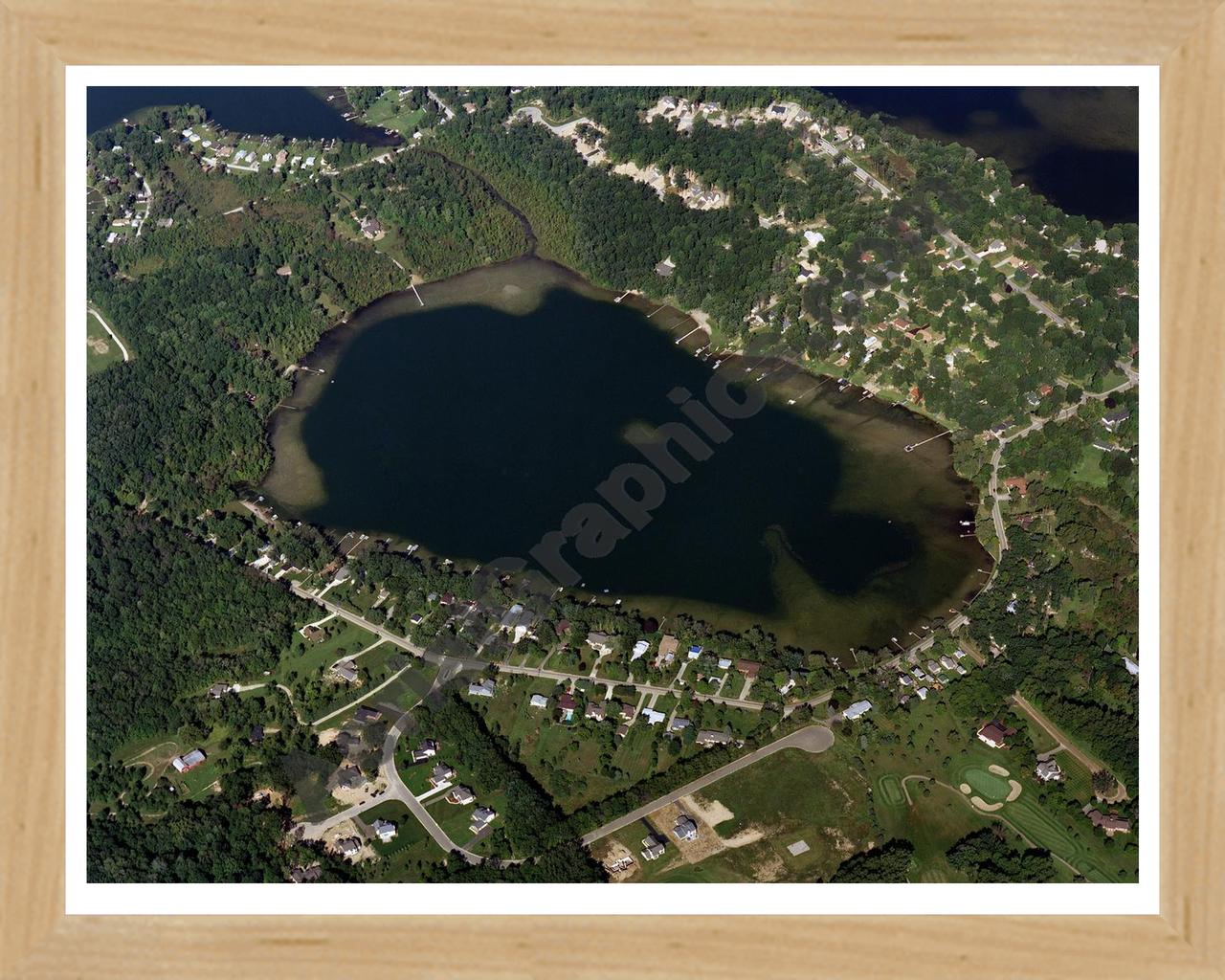 Aerial image of [2989] Maxfield Lake in Livingston, MI with Natural Wood frame