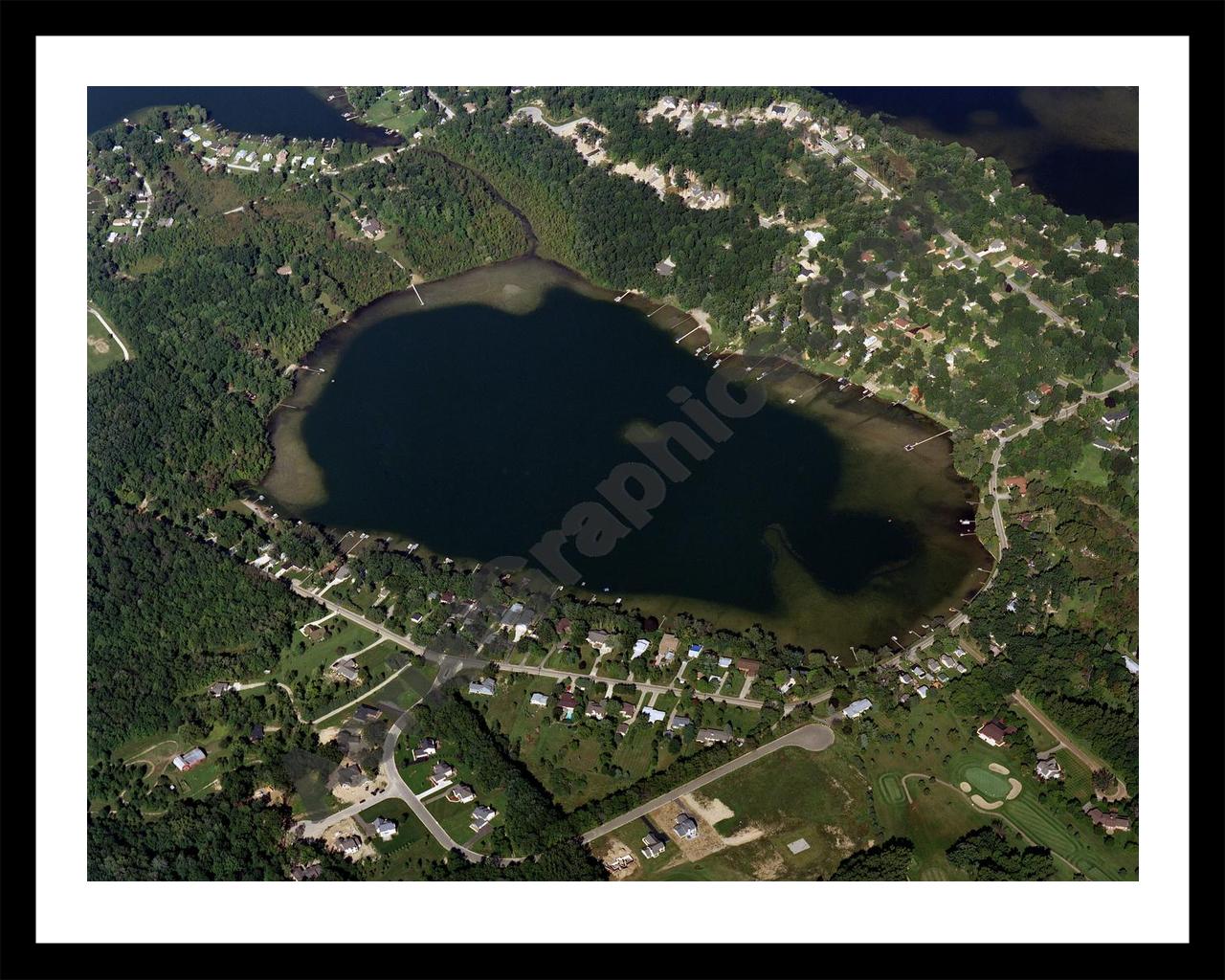 Aerial image of [2989] Maxfield Lake in Livingston, MI with Black Metal frame