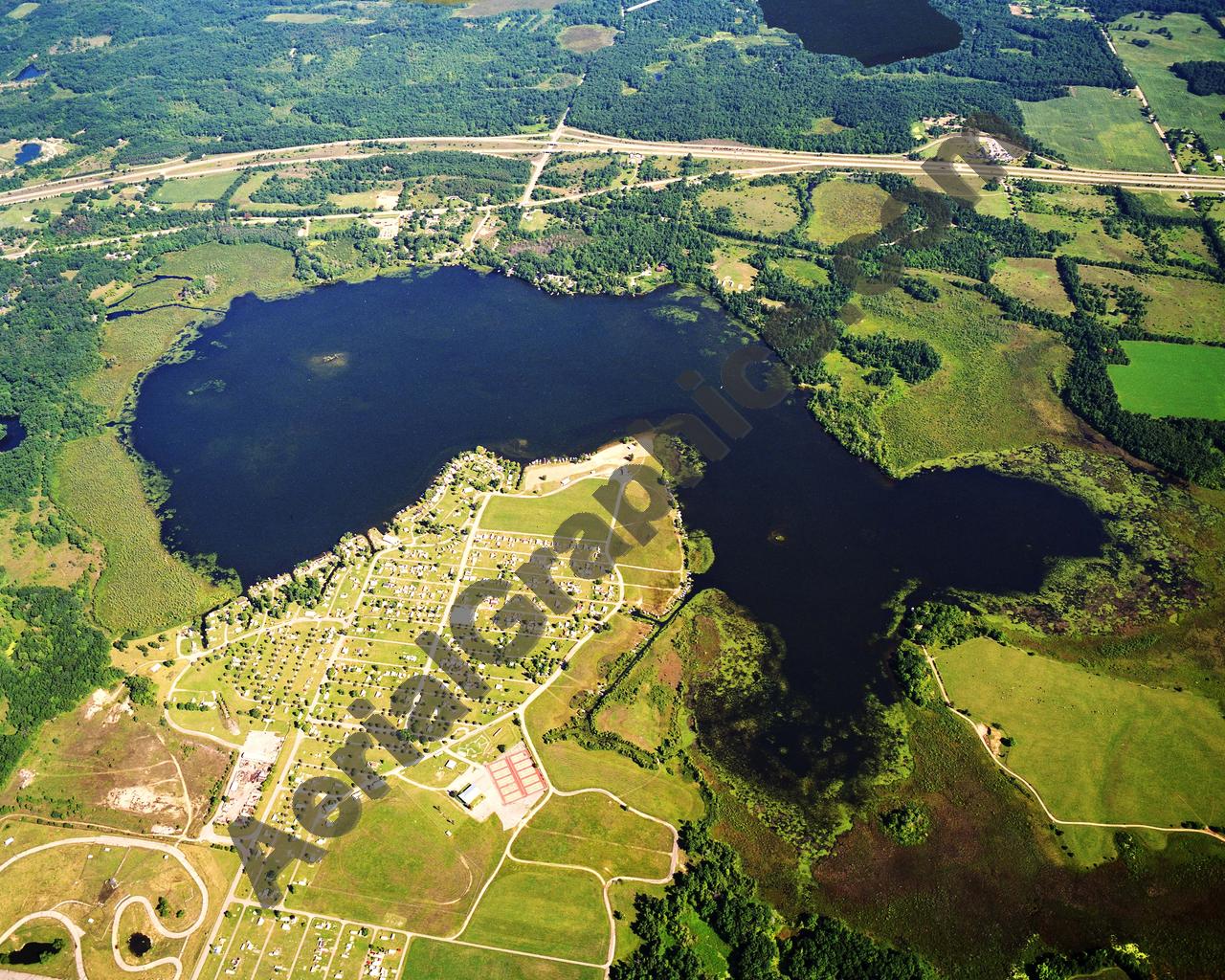 Aerial image of [299] Goose Lake in Jackson, MI with Canvas Wrap frame