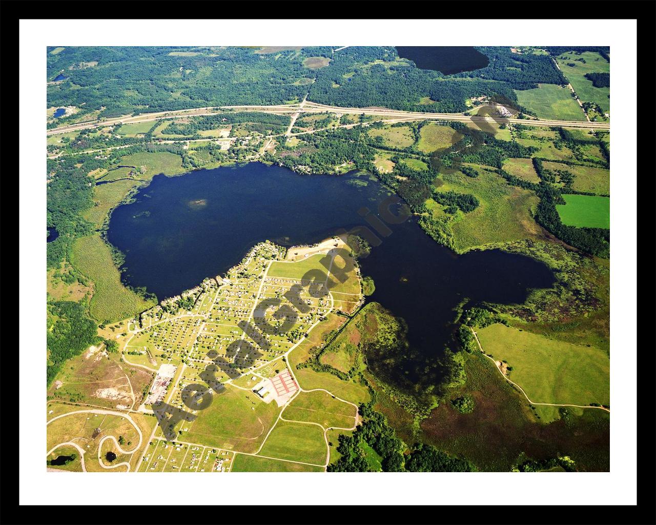 Aerial image of [299] Goose Lake in Jackson, MI with Black Metal frame