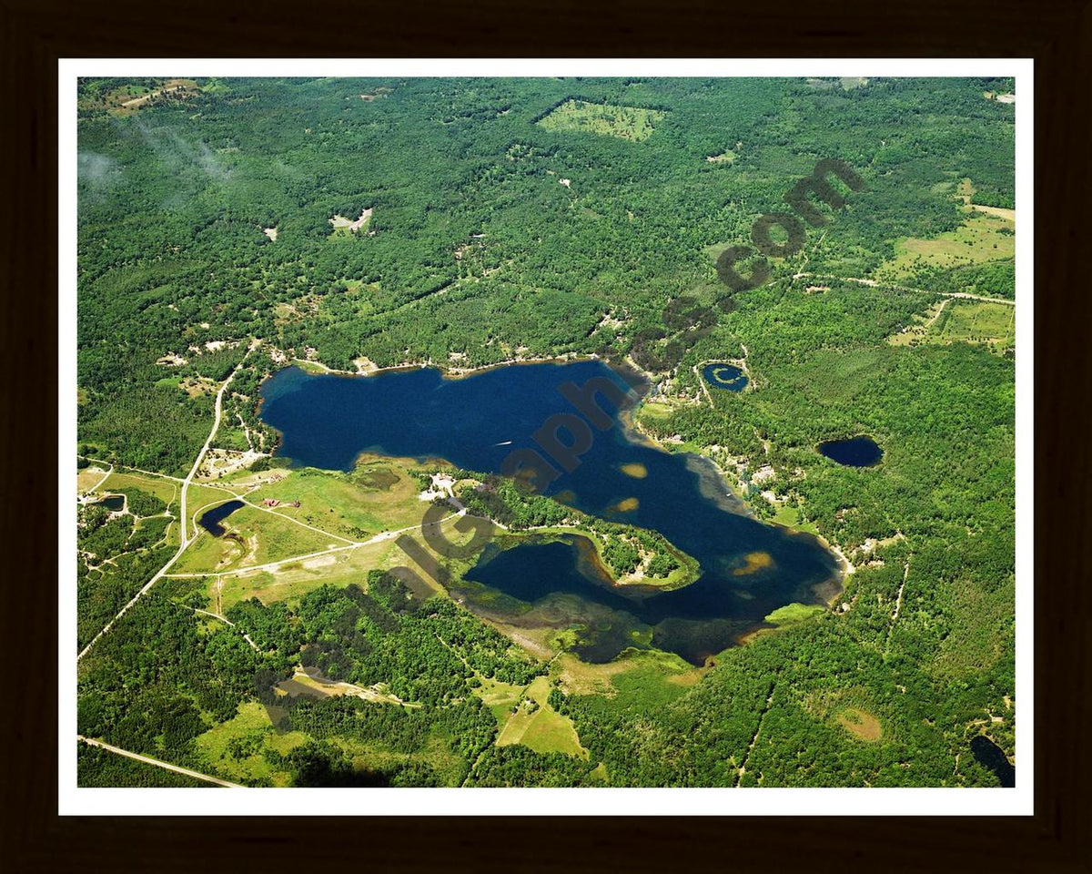 Aerial image of [3219] McCollum Lake in Oscoda, MI with Black Wood frame