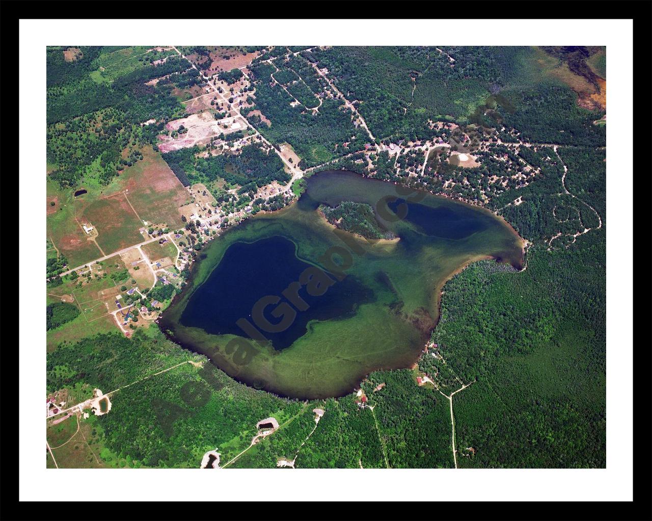 Aerial image of [3221] Jewell Lake in Alcona, MI with Black Metal frame