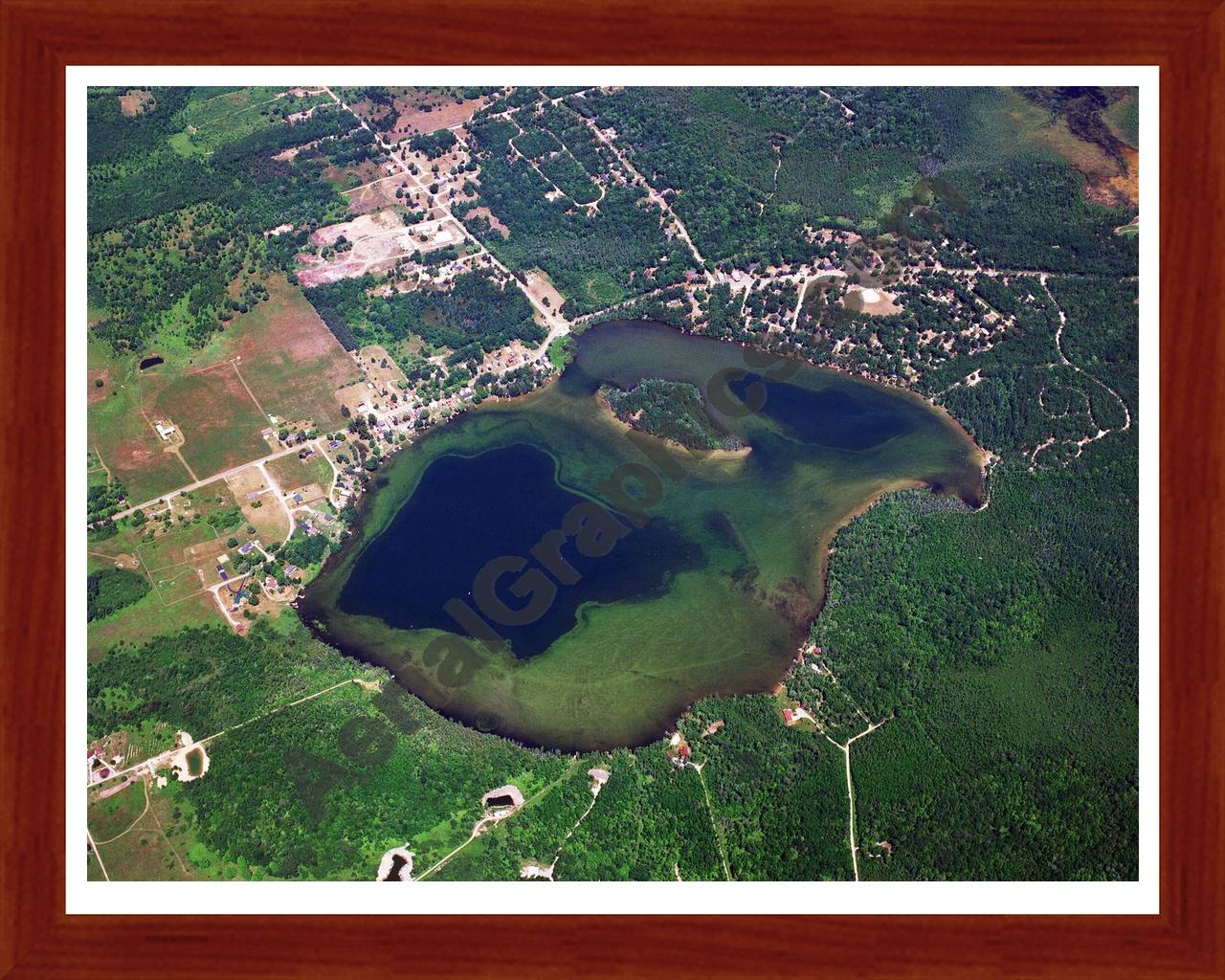 Aerial image of [3221] Jewell Lake in Alcona, MI with Cherry Wood frame