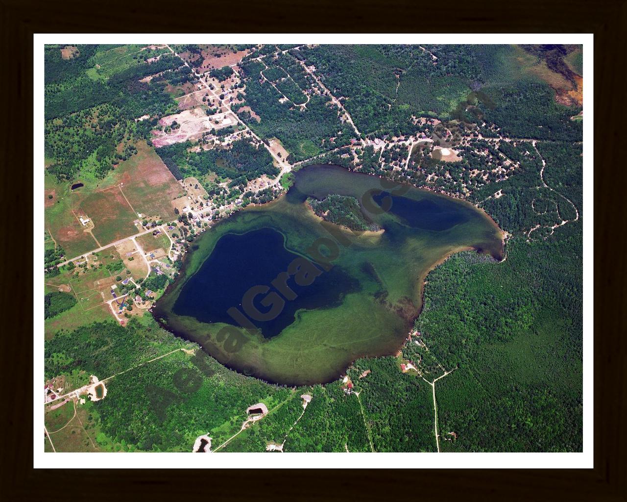 Aerial image of [3221] Jewell Lake in Alcona, MI with Black Wood frame