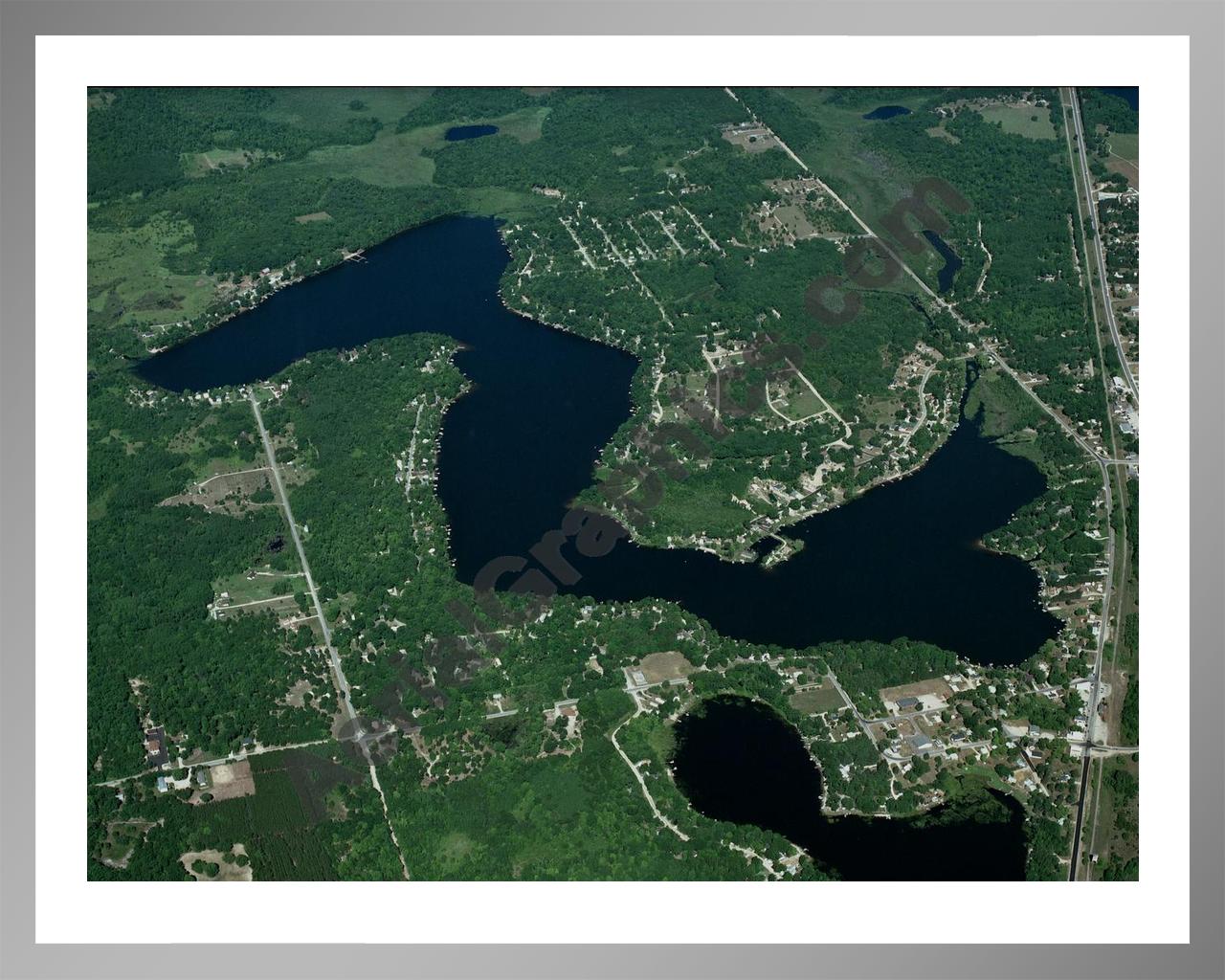 Aerial image of [3245] Crooked  Lake in Clare, MI with Silver Metal frame