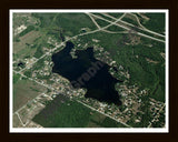 Aerial image of [3247] Lake Thirteen in Clare, MI with Black Wood frame