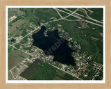 Aerial image of [3247] Lake Thirteen in Clare, MI with Natural Wood frame