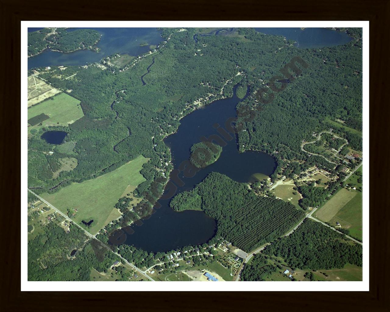 Aerial image of [3262] School Section Lake in Mecosta, MI with Black Wood frame