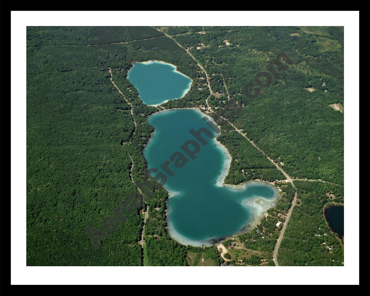 Aerial image of [3277] Blue Lake in Kalkaska, MI with Black Metal frame