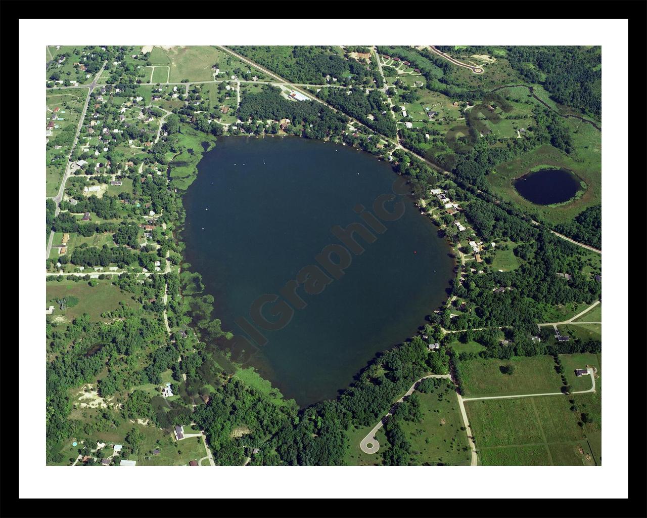 Aerial image of [328] Hamburg Lake in Livingston, MI with Black Metal frame