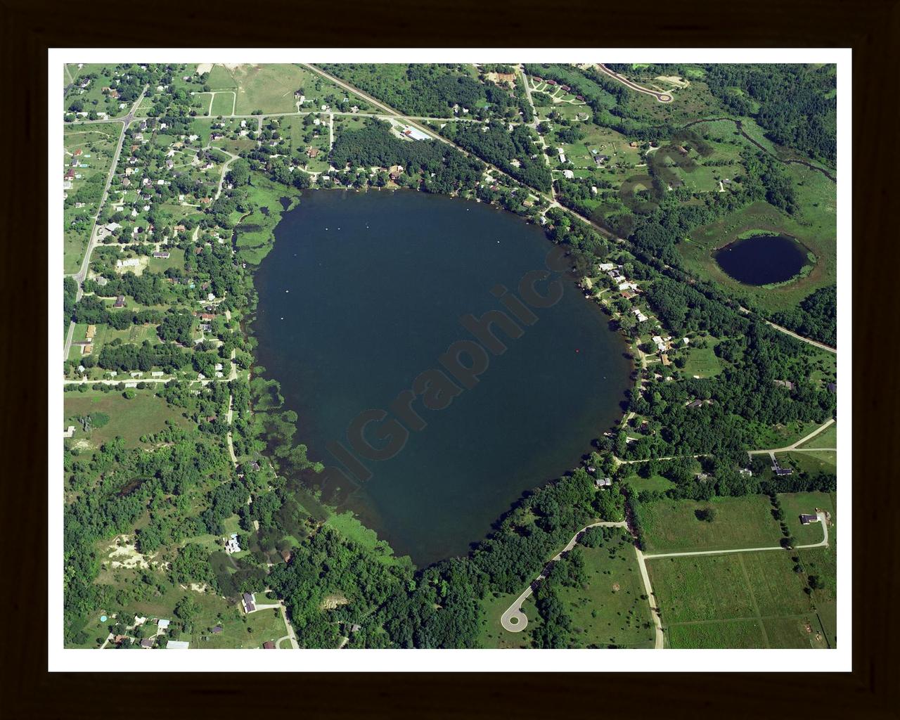 Aerial image of [328] Hamburg Lake in Livingston, MI with Black Wood frame