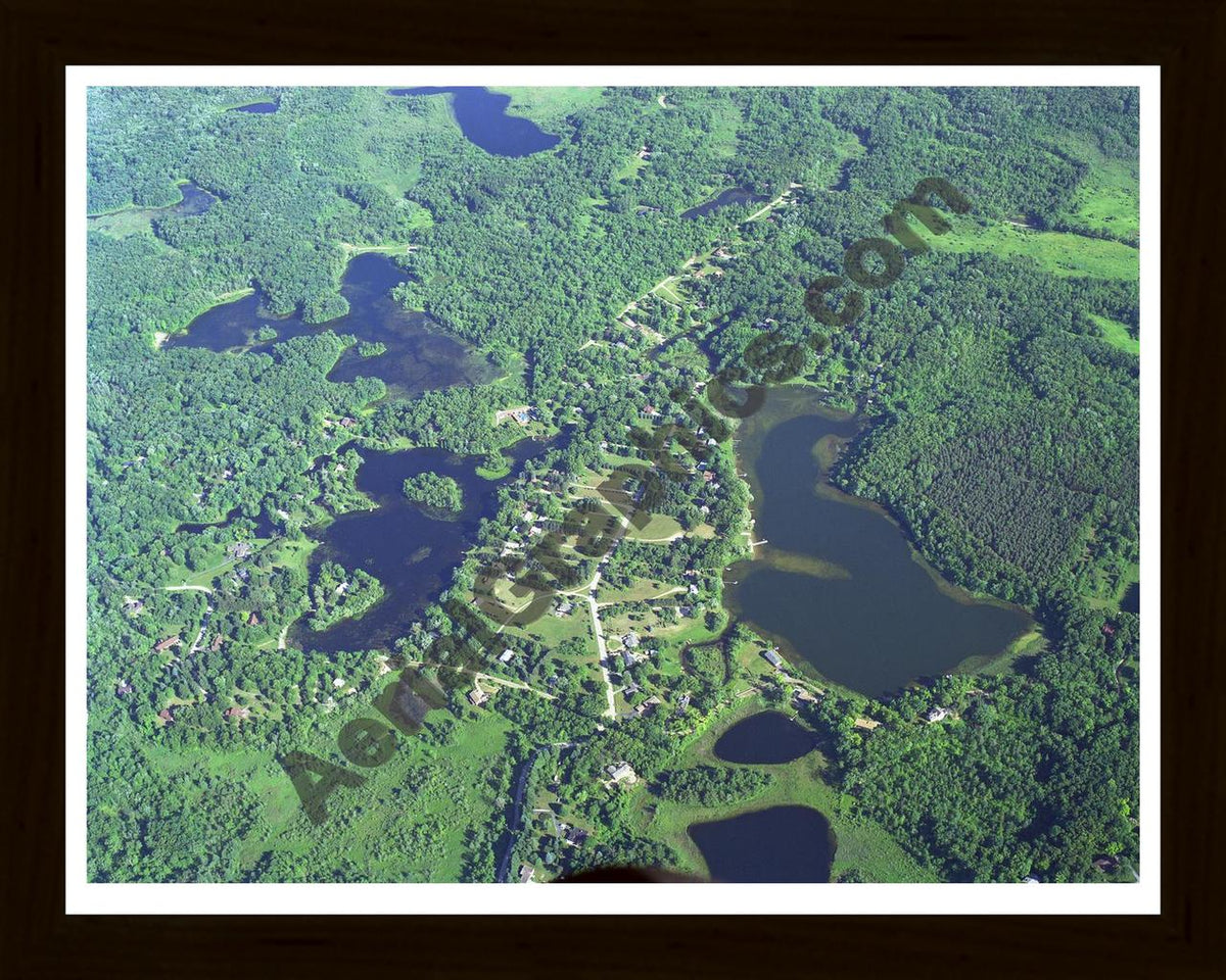 Aerial image of [3291] Indian Lake in Oakland, MI with Black Wood frame