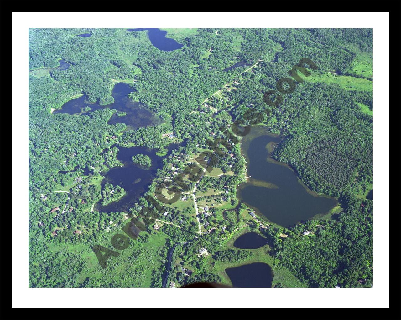 Aerial image of [3291] Indian Lake in Oakland, MI with Black Metal frame