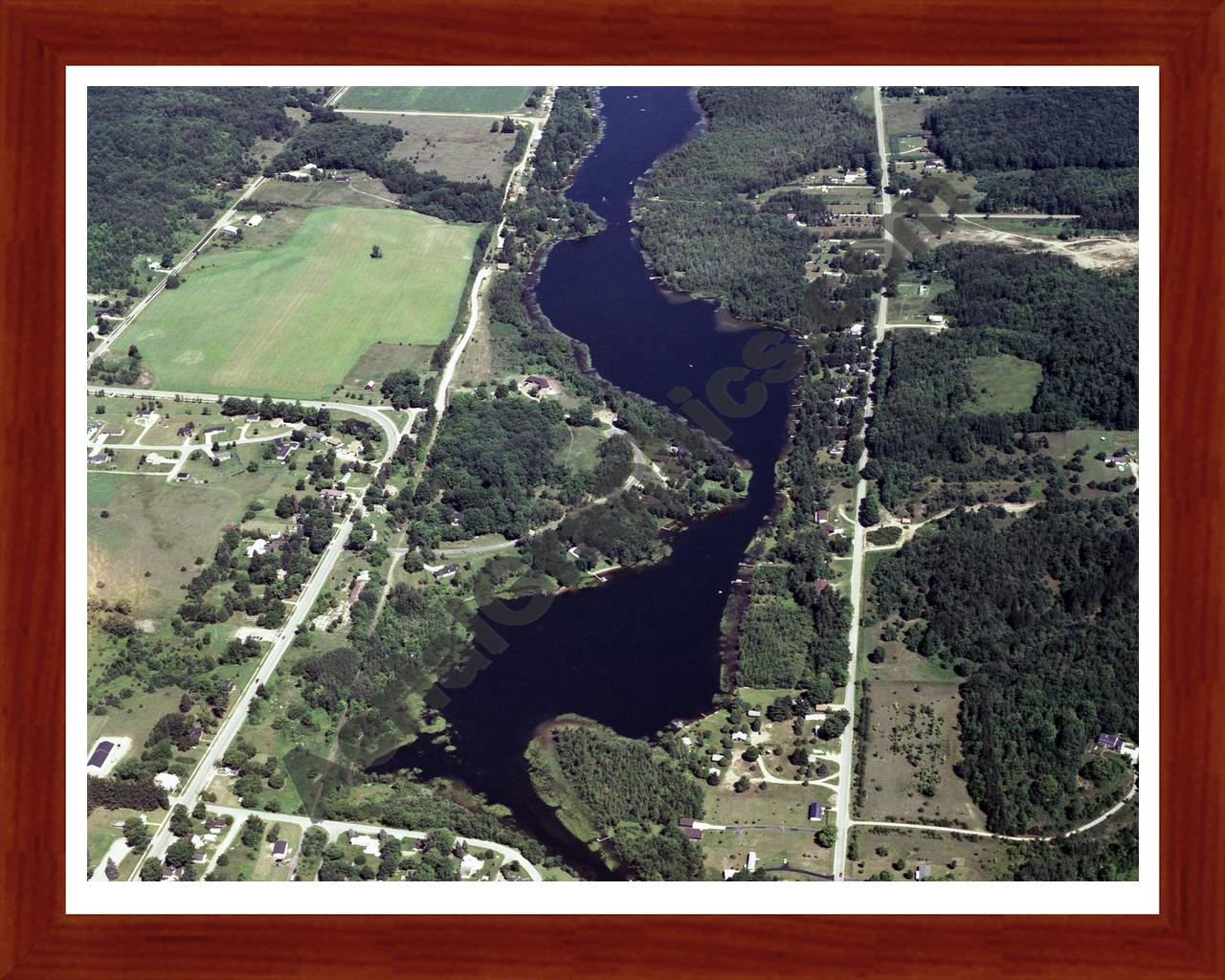 Aerial image of [331] Hanley Lake in Antrim, MI with Cherry Wood frame