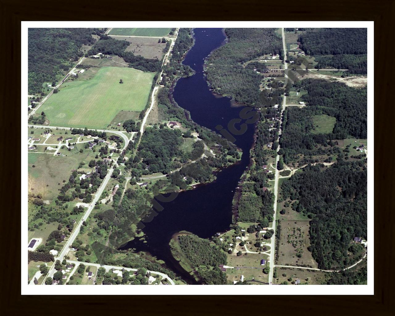 Aerial image of [331] Hanley Lake in Antrim, MI with Black Wood frame