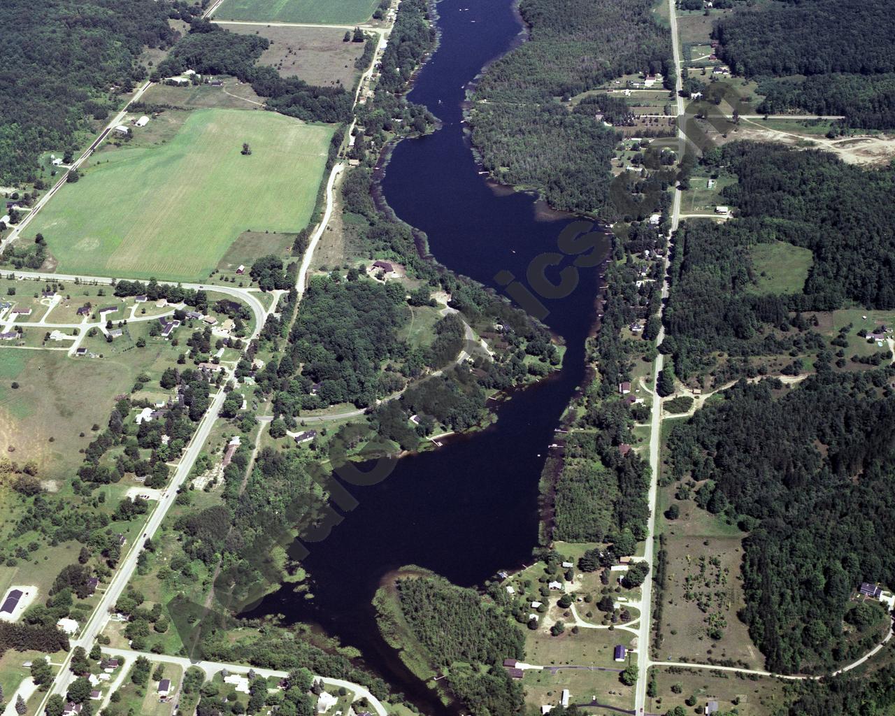 Aerial image of [331] Hanley Lake in Antrim, MI with Canvas Wrap frame