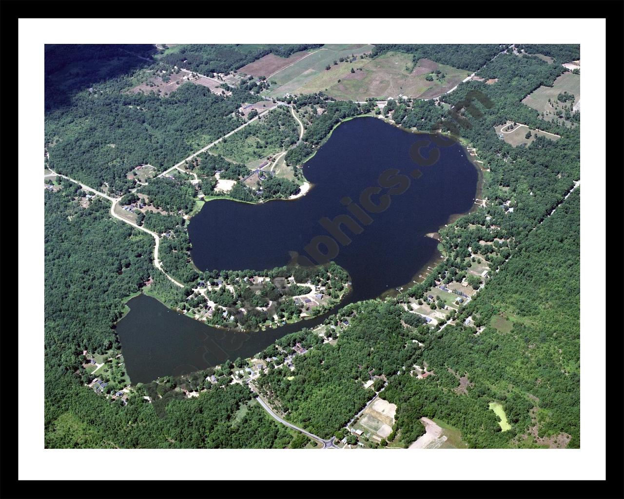 Aerial image of [3552] Great Bear Lake in Van Buren, MI with Black Metal frame