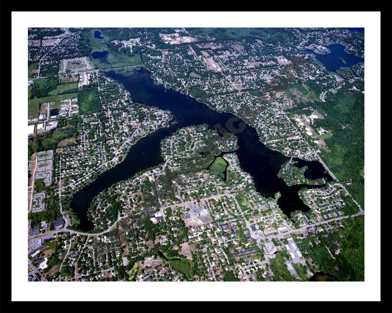 Aerial image of [3557] Wolverine Lake in Oakland, MI with Black Metal frame