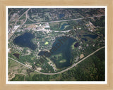 Aerial image of [3566] Fonda Lake, Island Lake & Briggs Lake in Livingston, MI with Natural Wood frame