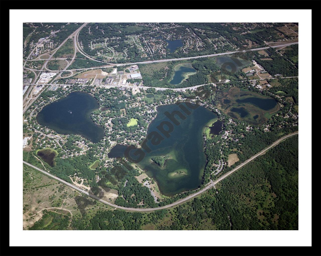 Aerial image of [3566] Fonda Lake, Island Lake & Briggs Lake in Livingston, MI with Black Metal frame