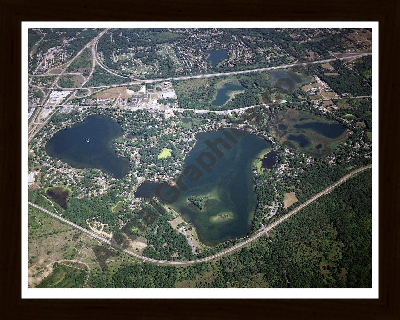 Aerial image of [3566] Fonda Lake, Island Lake & Briggs Lake in Livingston, MI with Black Wood frame