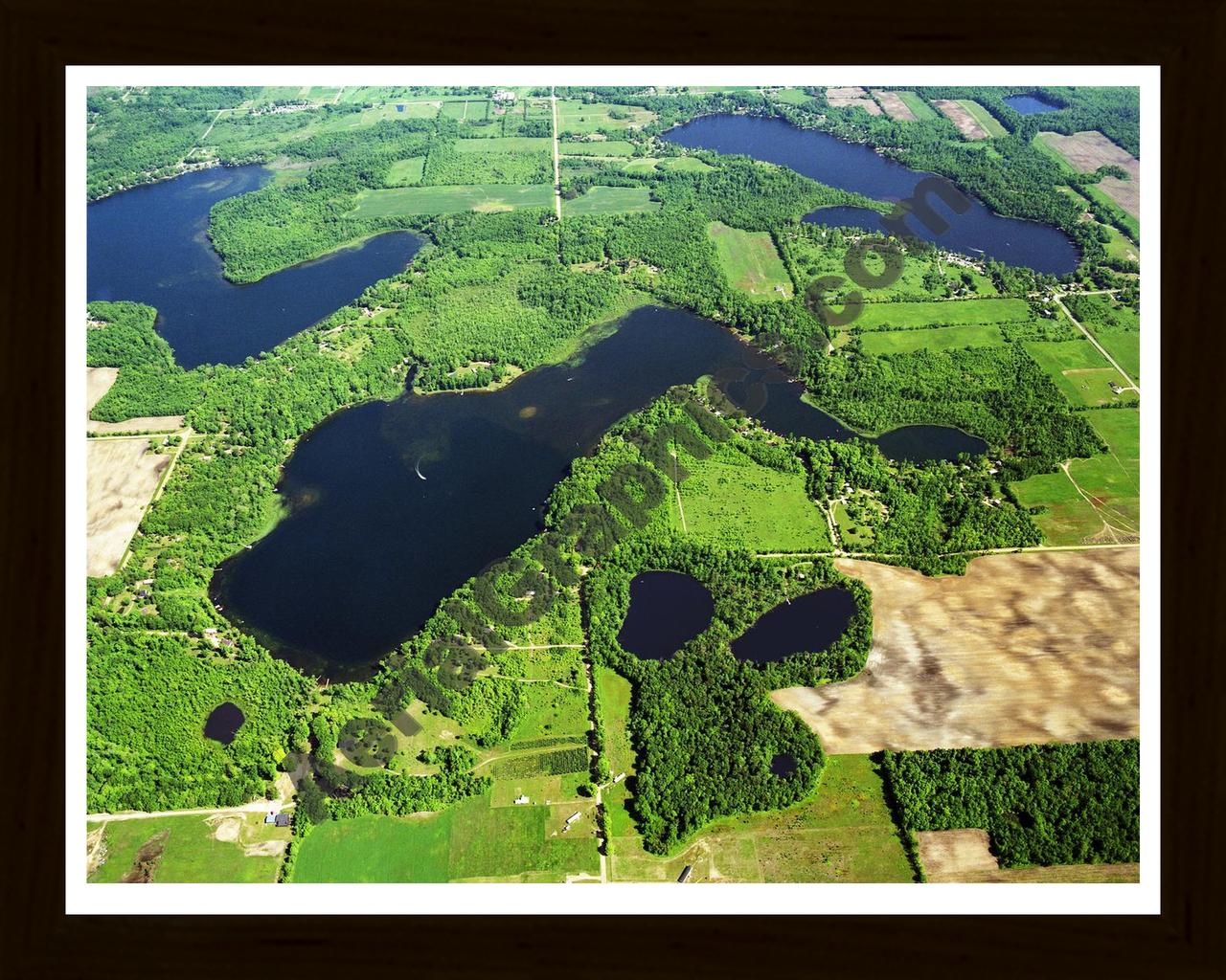 Aerial image of [3585] Muskrat Lake in Van Buren, MI with Black Wood frame