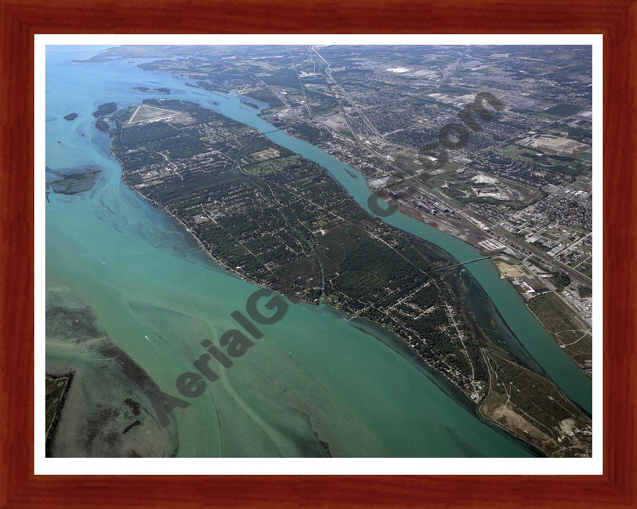 Aerial image of [3666] Grosse Ile, looking South in Wayne, MI with Cherry Wood frame