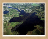 Aerial image of [3673] Center Lake in Jackson, MI with Natural Wood frame