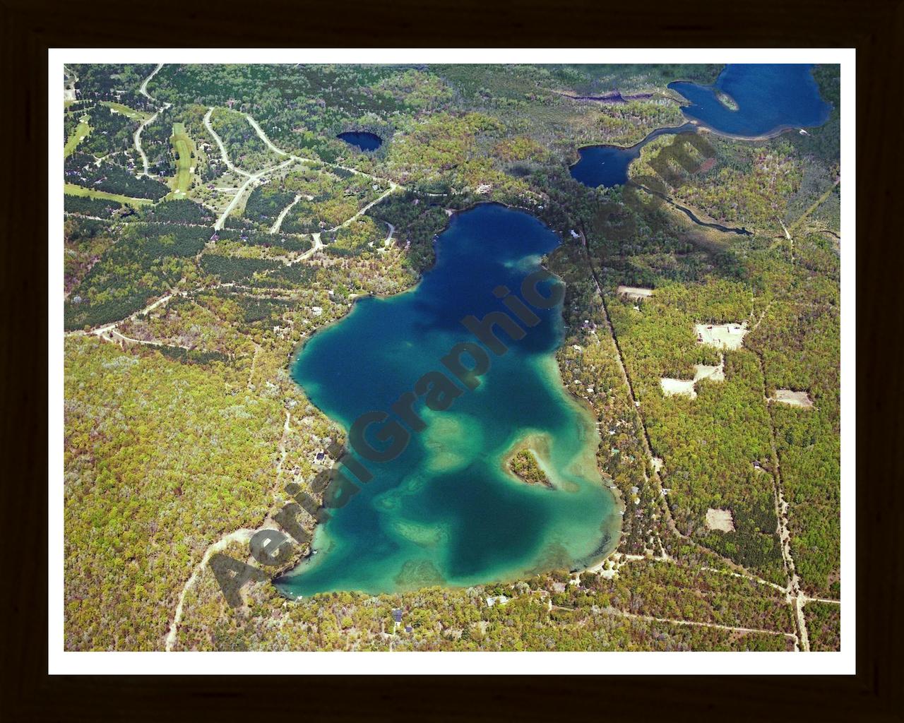 Aerial image of [3689] Opal Lake in Otsego, MI with Black Wood frame