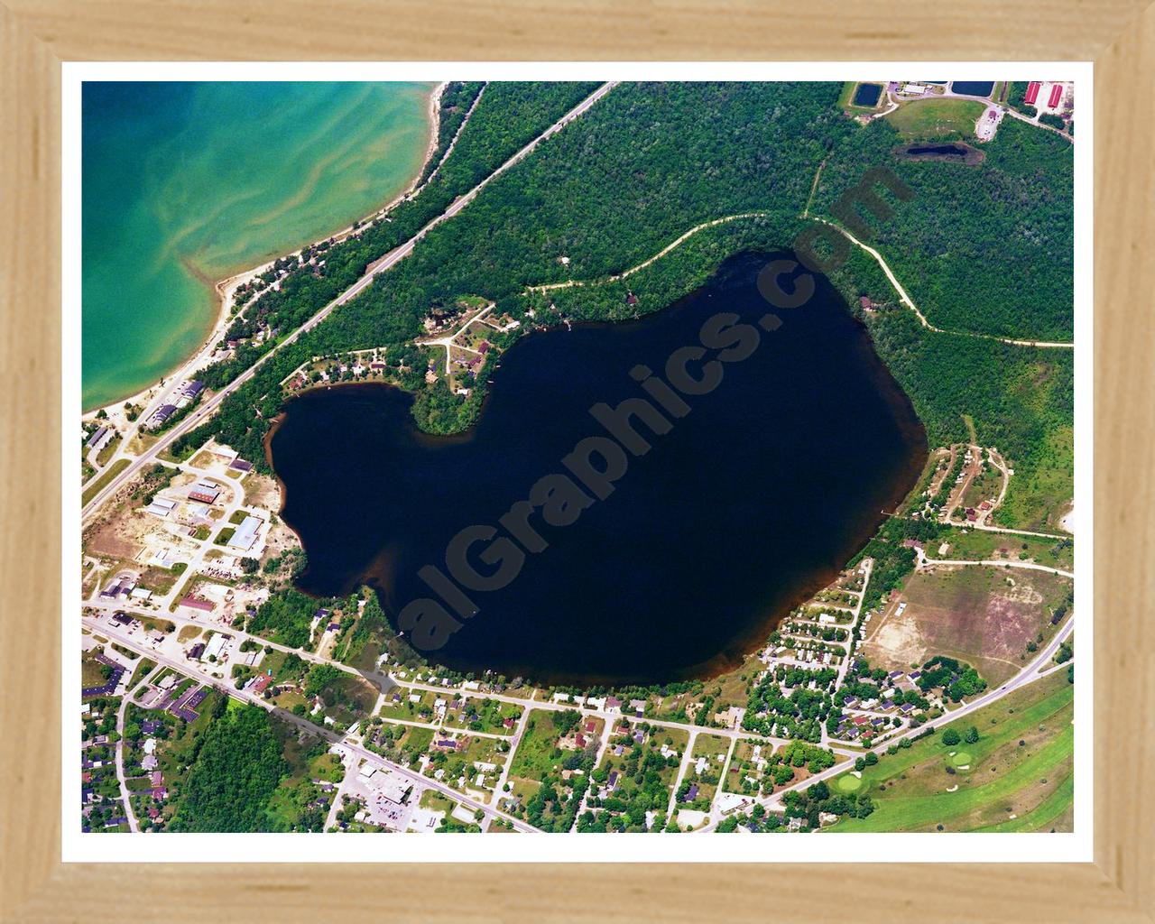 Aerial image of [36] Bass Lake in Antrim, MI with Natural Wood frame