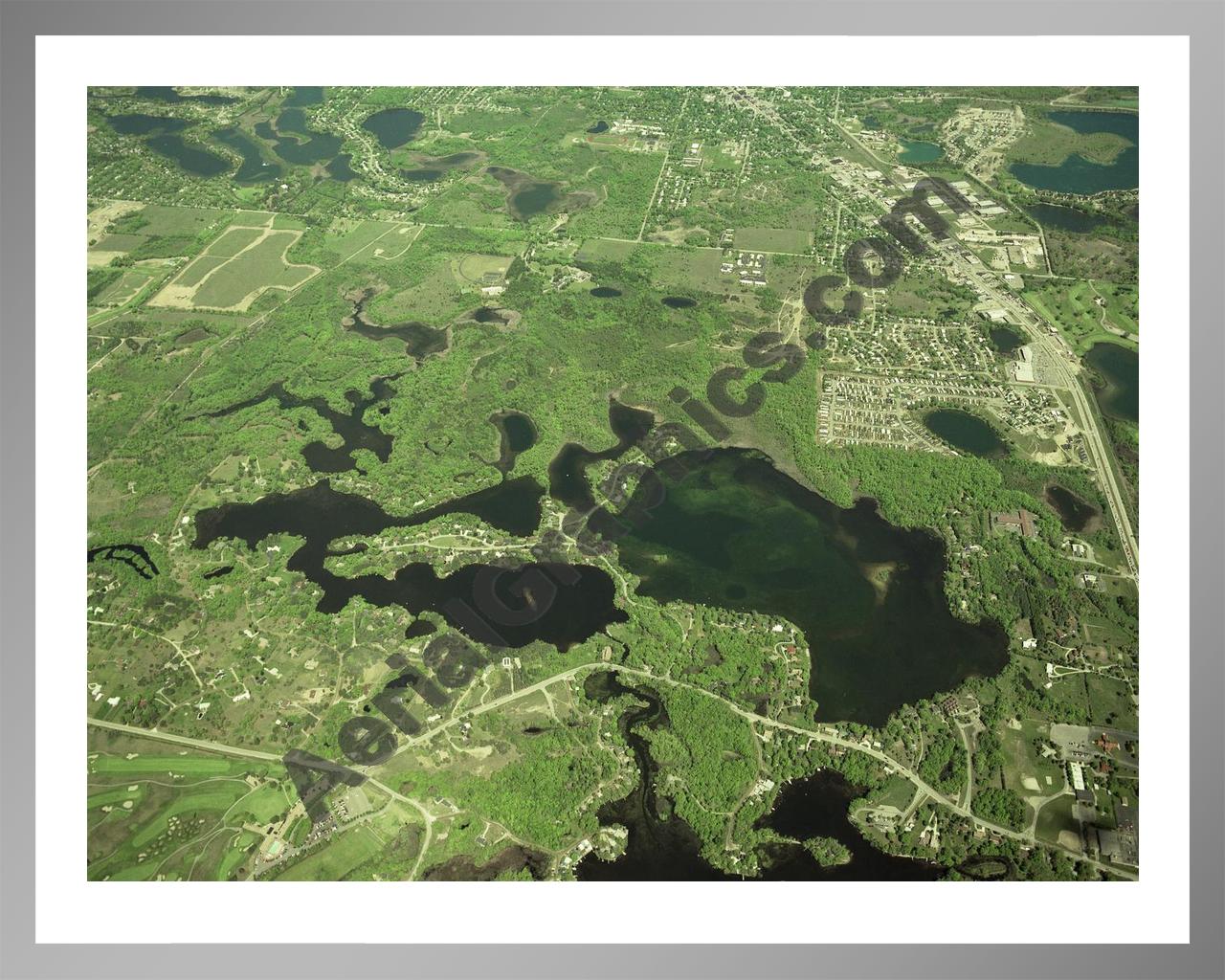 Aerial image of [379] Indianwood & Manitou Lakes in Oakland, MI with Silver Metal frame