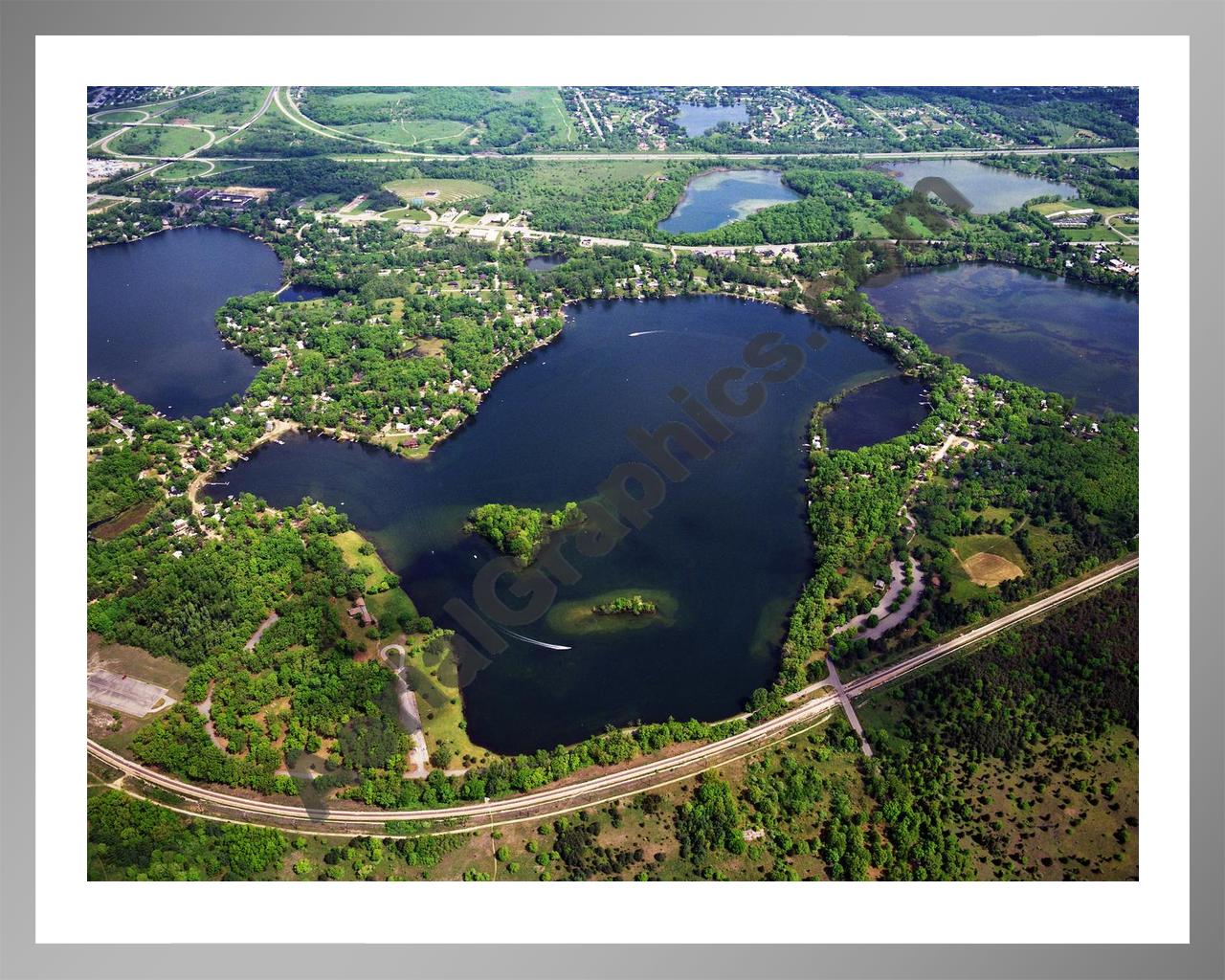 Aerial image of [384] Island Lake in Livingston, MI with Silver Metal frame