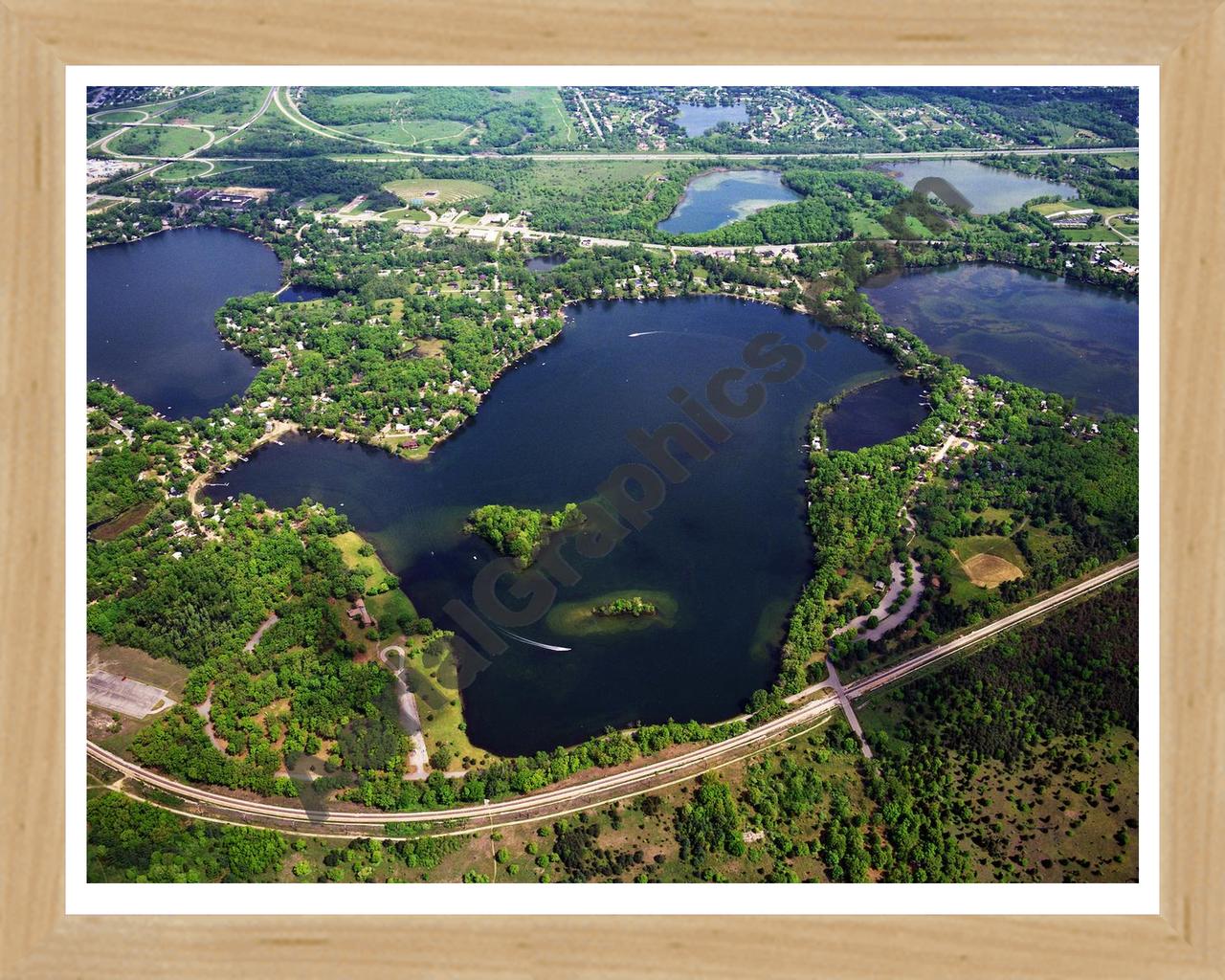 Aerial image of [384] Island Lake in Livingston, MI with Natural Wood frame