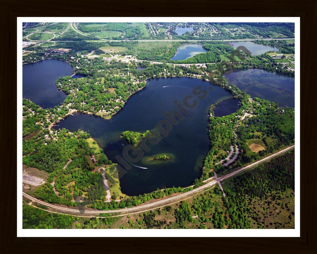 Aerial image of [384] Island Lake in Livingston, MI with Black Wood frame