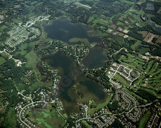 Aerial image of [3877] East & West Crooked Lakes & Clifford Lake in Livingston, MI with No frame