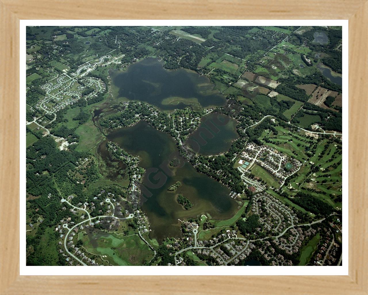 Aerial image of [3877] East & West Crooked Lakes & Clifford Lake in Livingston, MI with Natural Wood frame