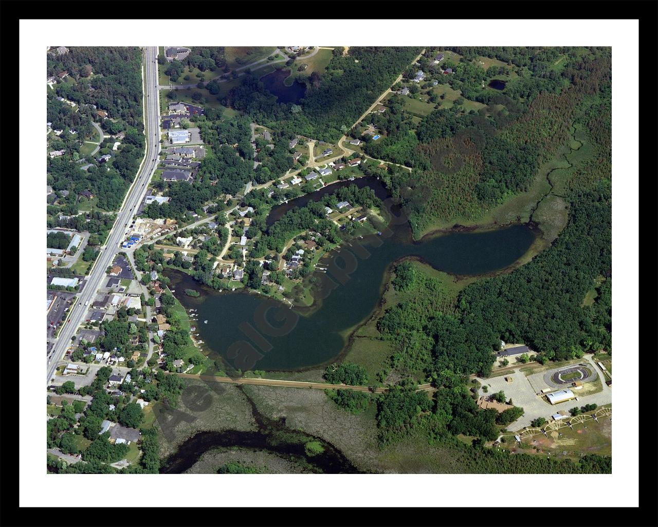 Aerial image of [3889] Townsend Lake in Oakland, MI with Black Metal frame