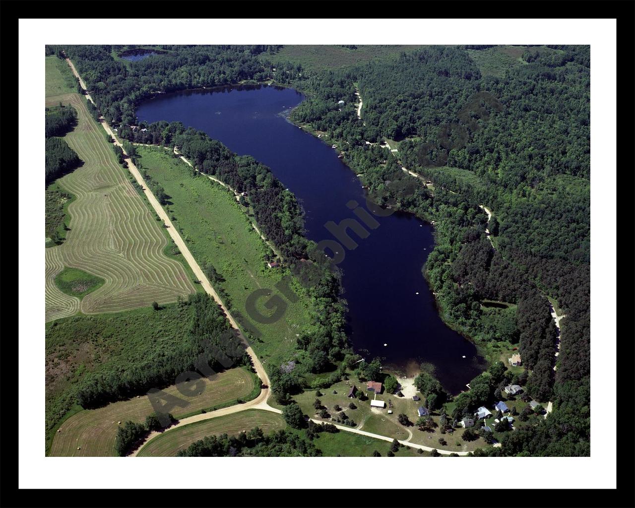 Aerial image of [3926] Little Long Lake in Osceola, MI with Black Metal frame