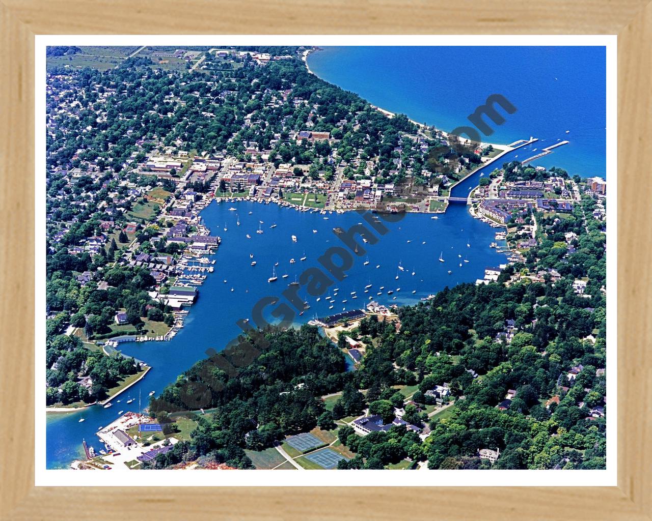 Aerial image of [3946] Round Lake Charlevoix in Charlevoix, MI with Natural Wood frame