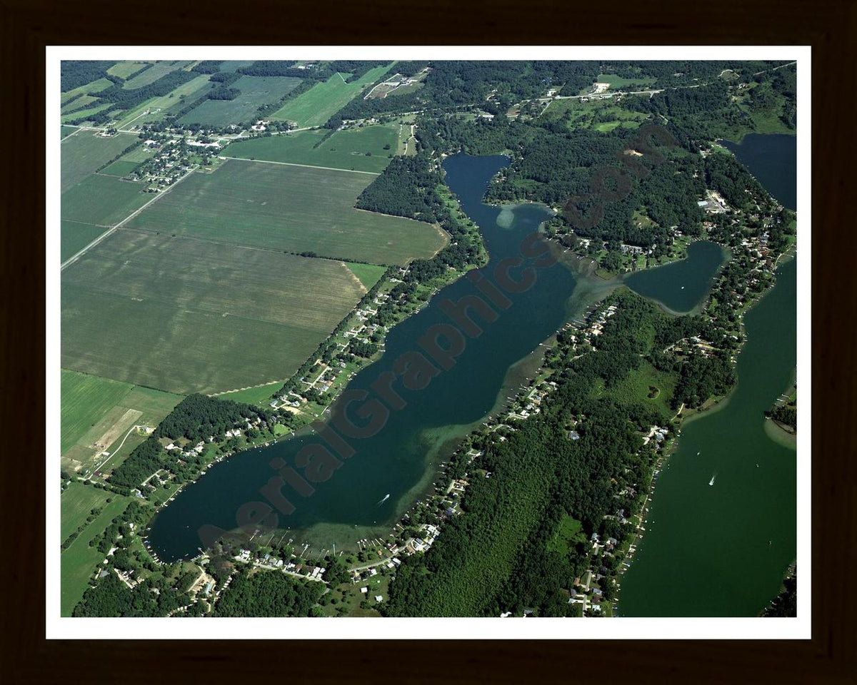 Aerial image of [3987] Baldwin Lake in Cass, MI with Black Wood frame