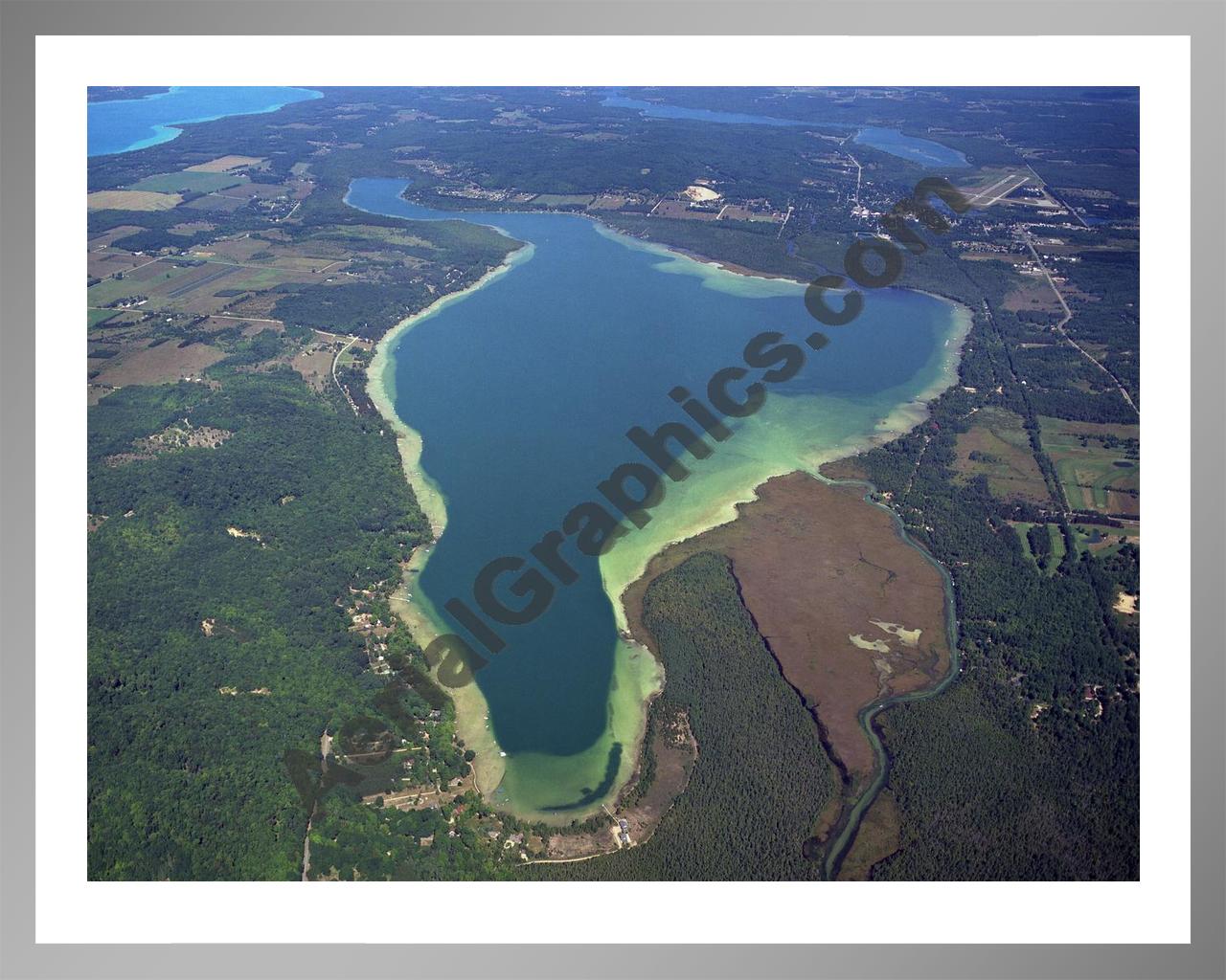 Aerial image of [4008] Lake Bellaire in Antrim, MI with Silver Metal frame