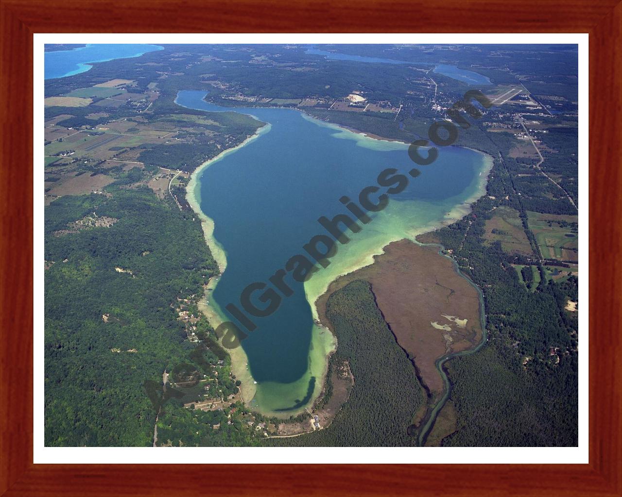 Aerial image of [4008] Lake Bellaire in Antrim, MI with Cherry Wood frame