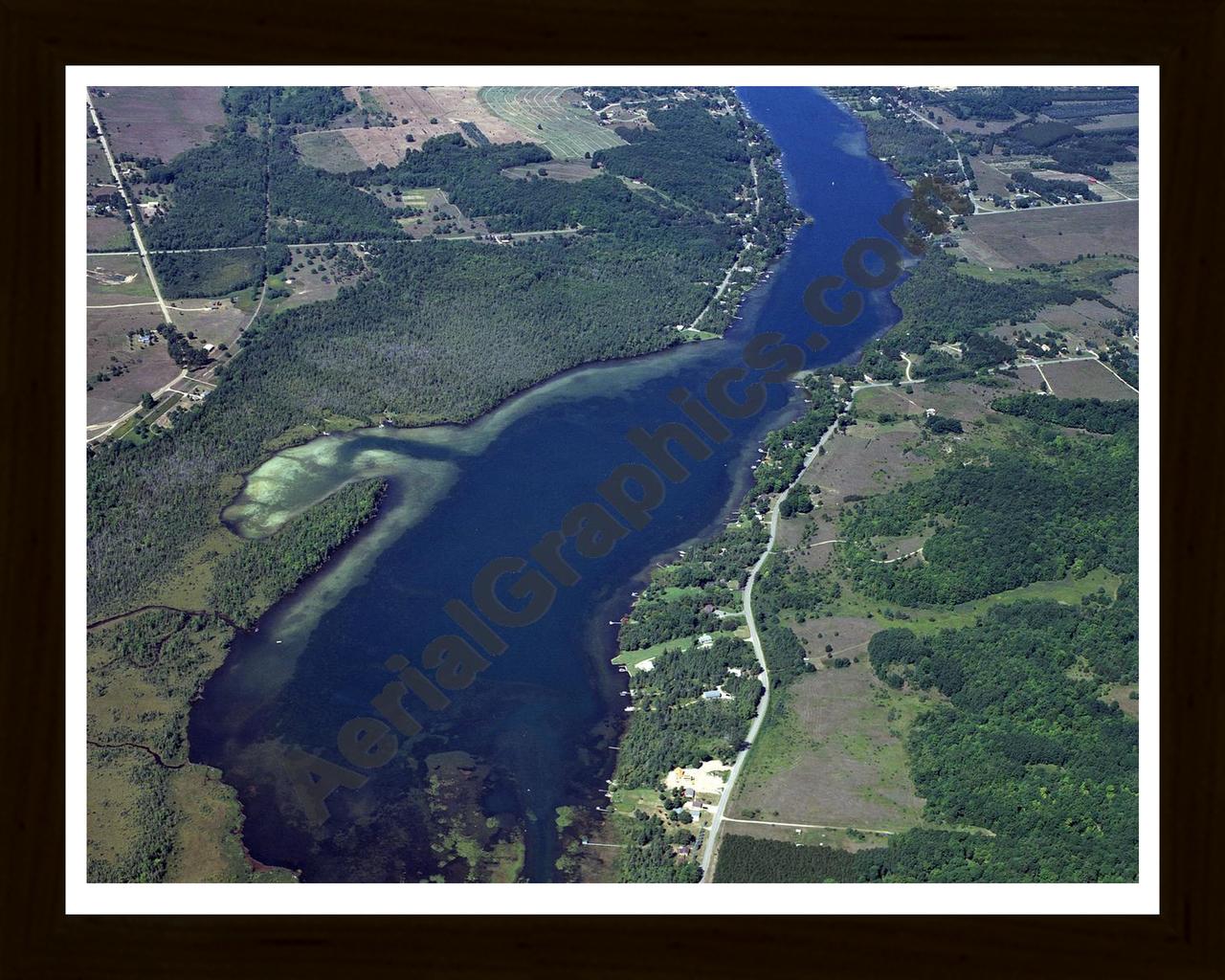 Aerial image of [4009] Clam Lake in Antrim, MI with Black Wood frame