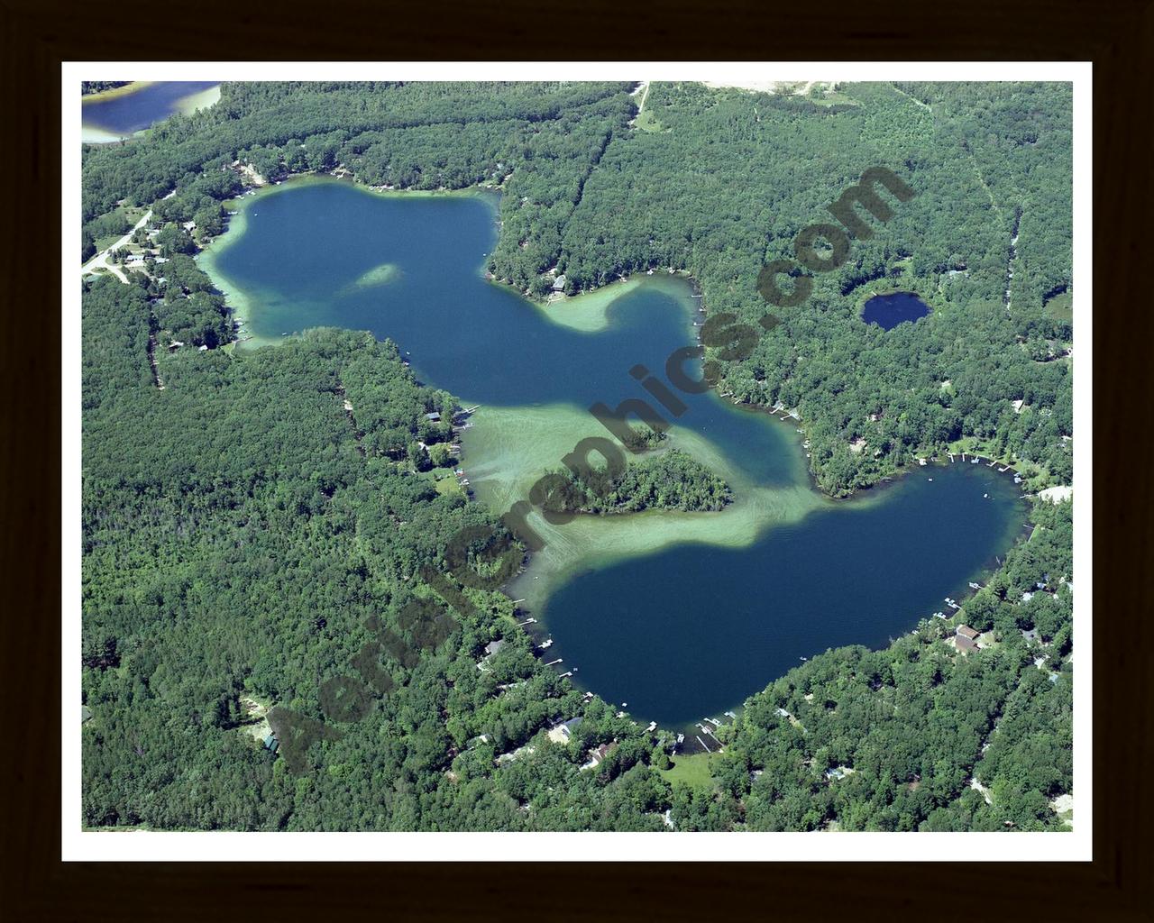 Aerial image of [4176] Harper Lake in Lake, MI with Black Wood frame