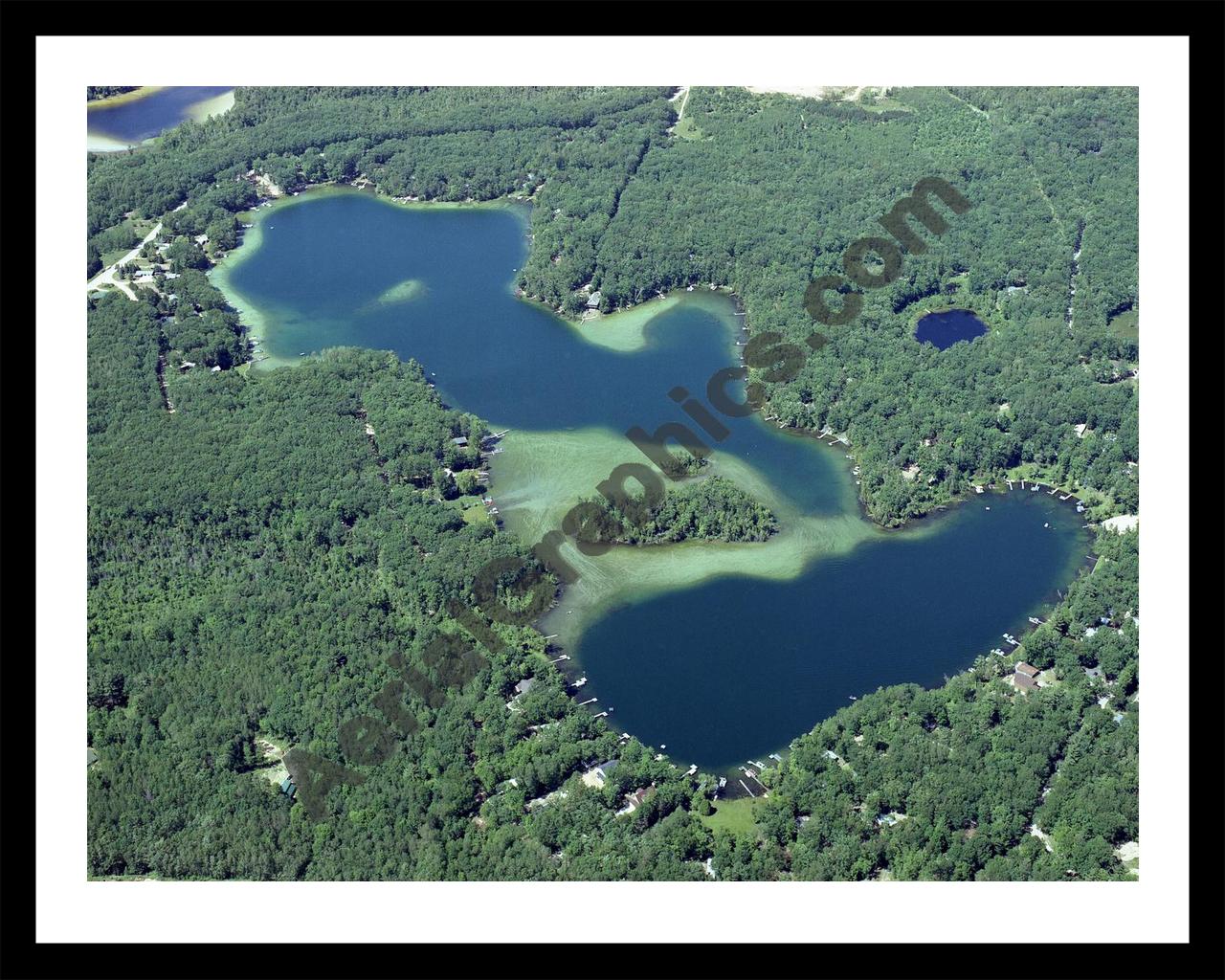 Aerial image of [4176] Harper Lake in Lake, MI with Black Metal frame