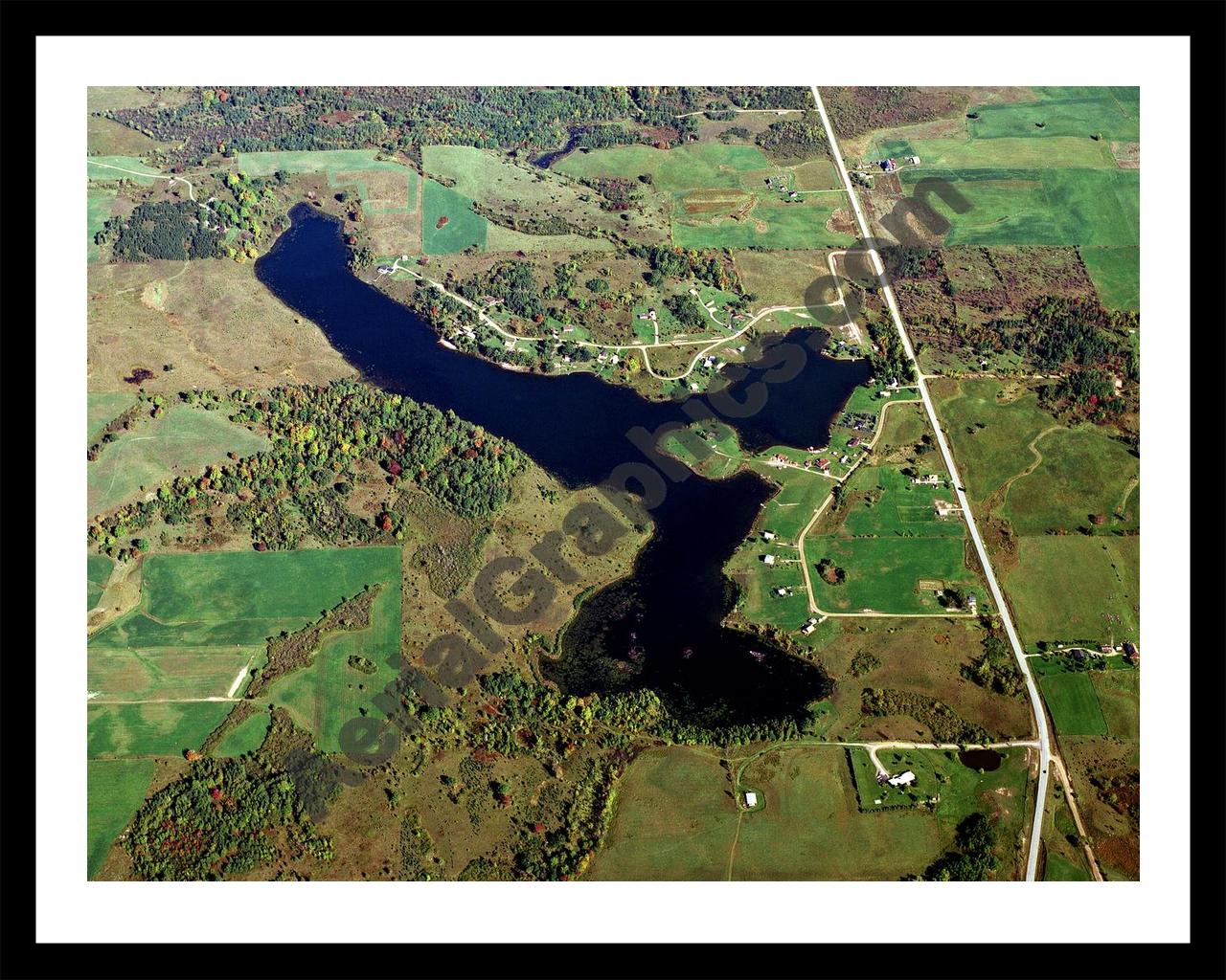 Aerial image of [418] Lake Lochbrae in Gladwin, MI with Black Metal frame