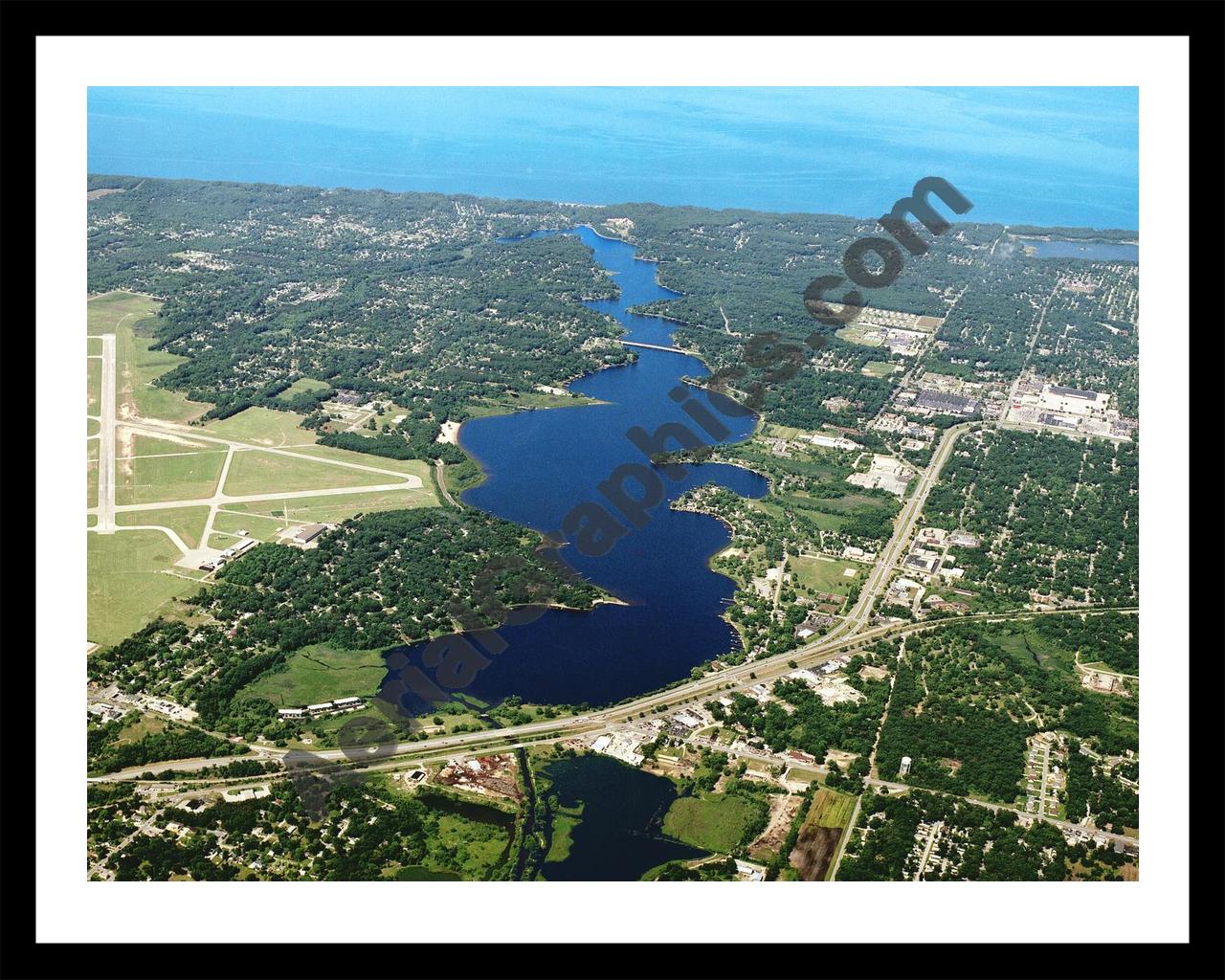 Aerial image of [4227] Mona Lake in Muskegon, MI with Black Metal frame