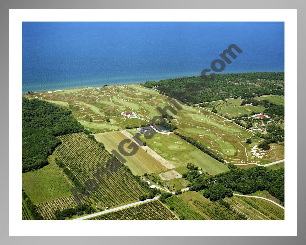 Aerial image of [4248] Arcadia Bluffs Golf Club looking West with Silver Metal frame