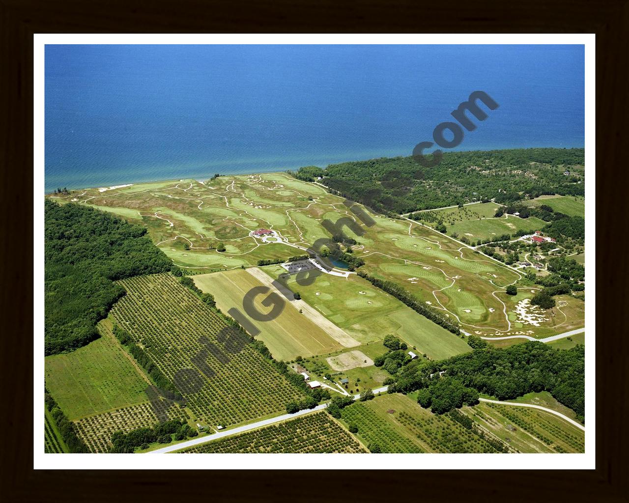 Aerial image of [4248] Arcadia Bluffs Golf Club looking West with Black Wood frame